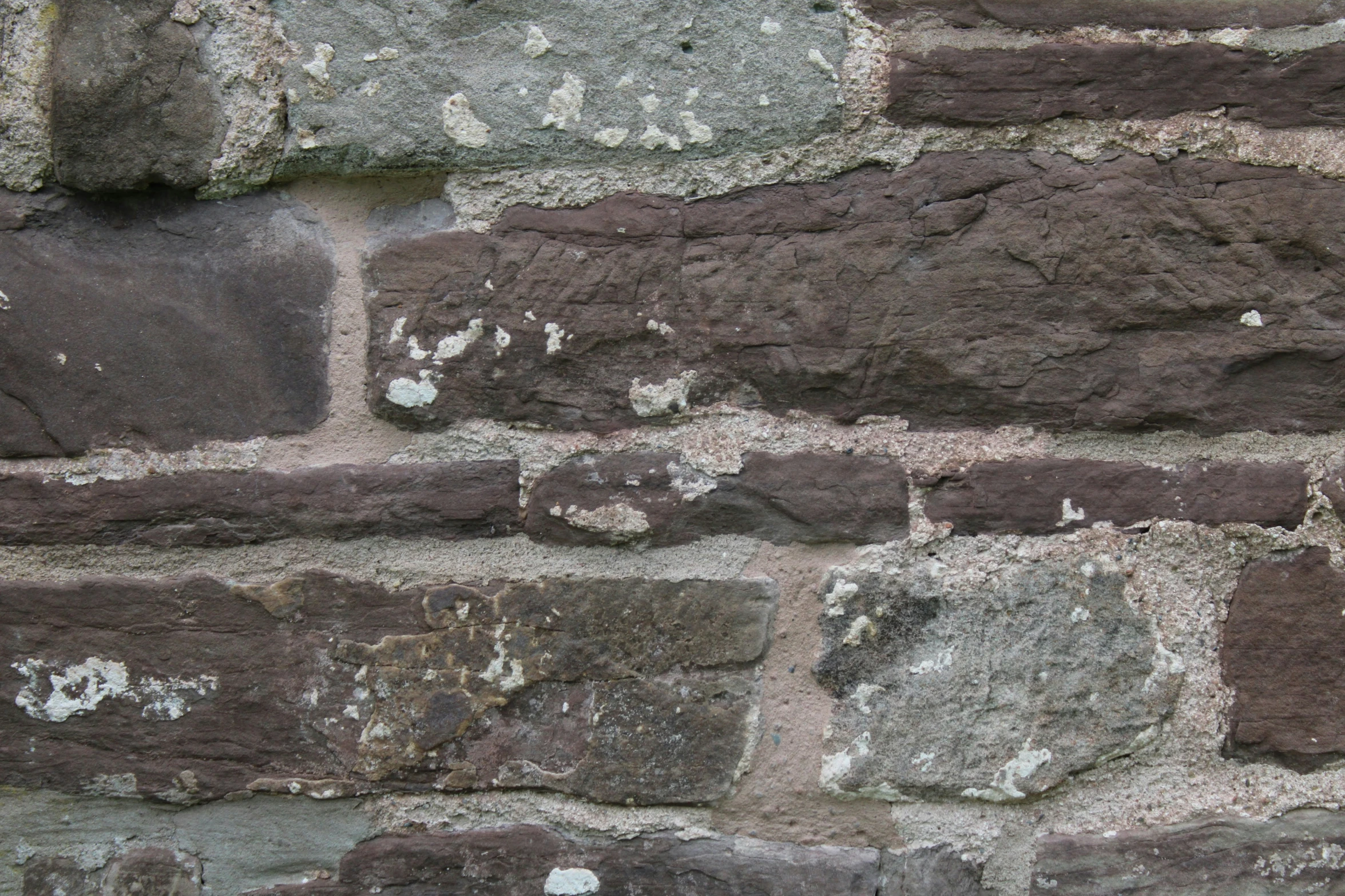 a close up of a stone wall with s