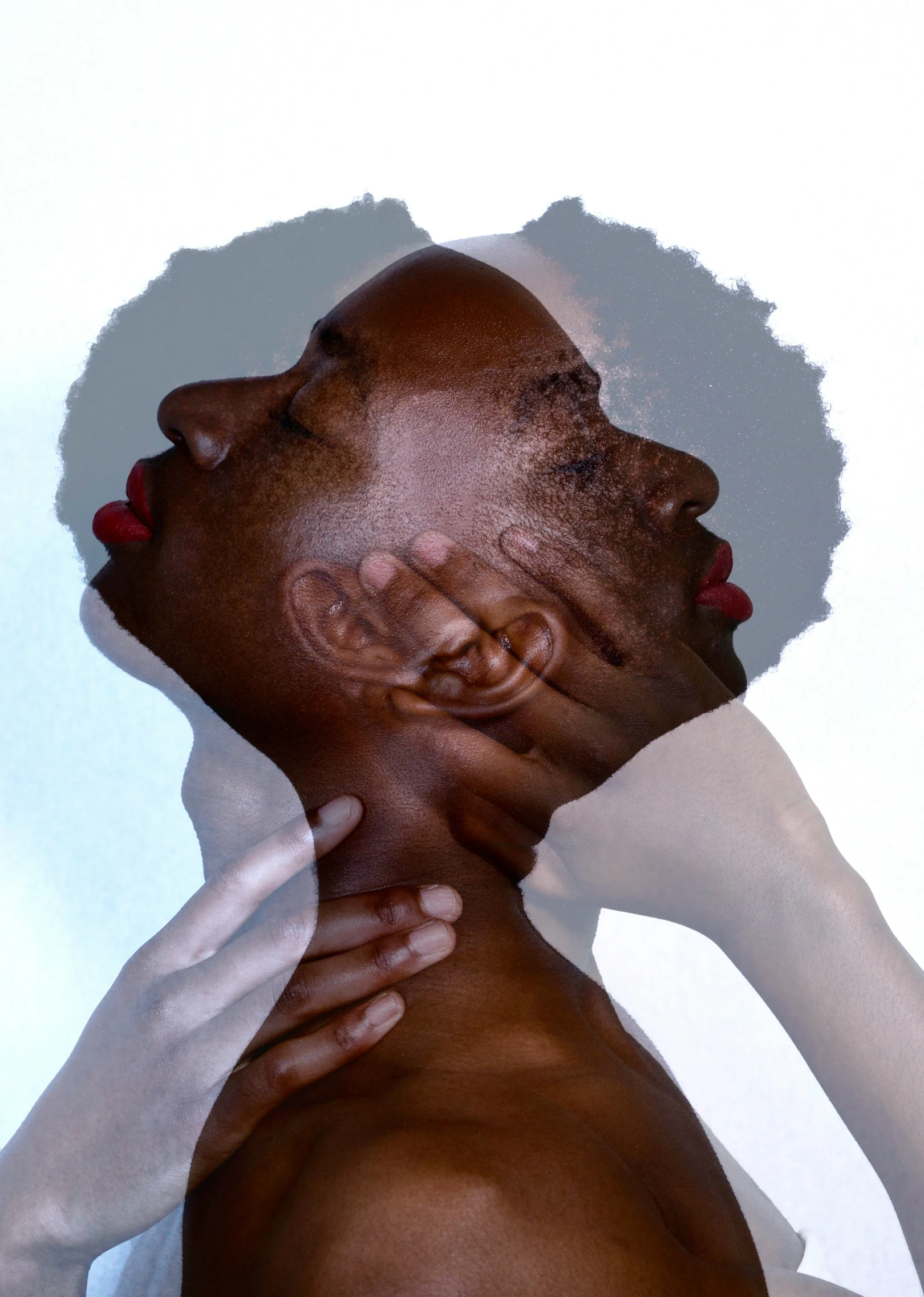 an african american woman has her face up to the ceiling