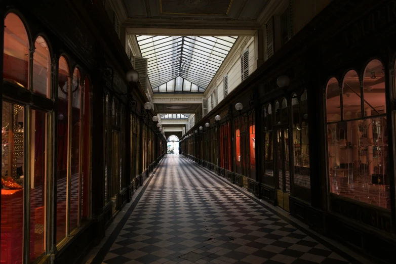 a walkway is shown in a dimly lit building