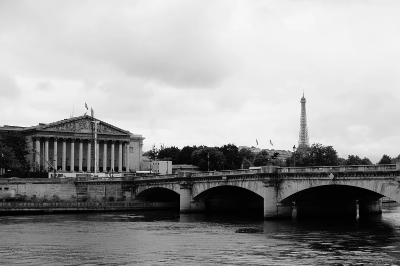 a bridge that is in the water and is spanning the width of it