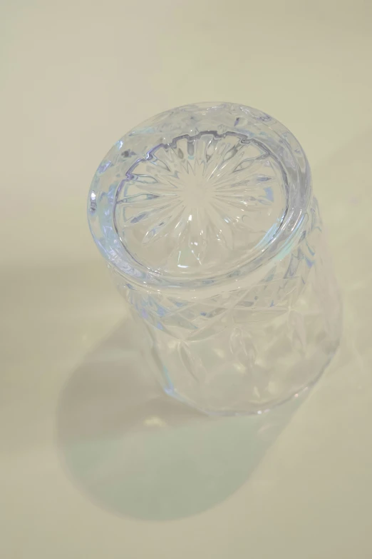 a glass bowl with a flowered design in it