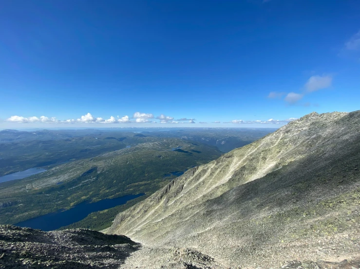 a person standing on top of a mountain