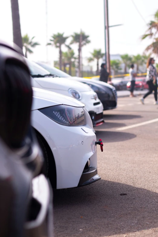 a couple of cars that are sitting in the street