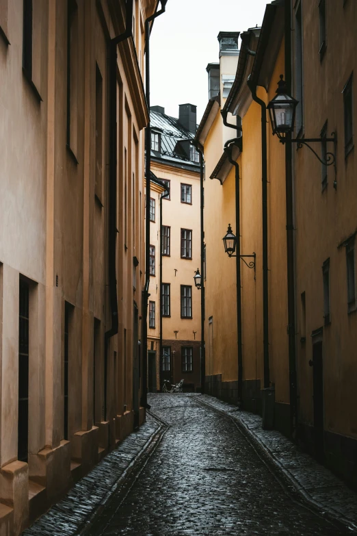 a cobblestone street in an old town