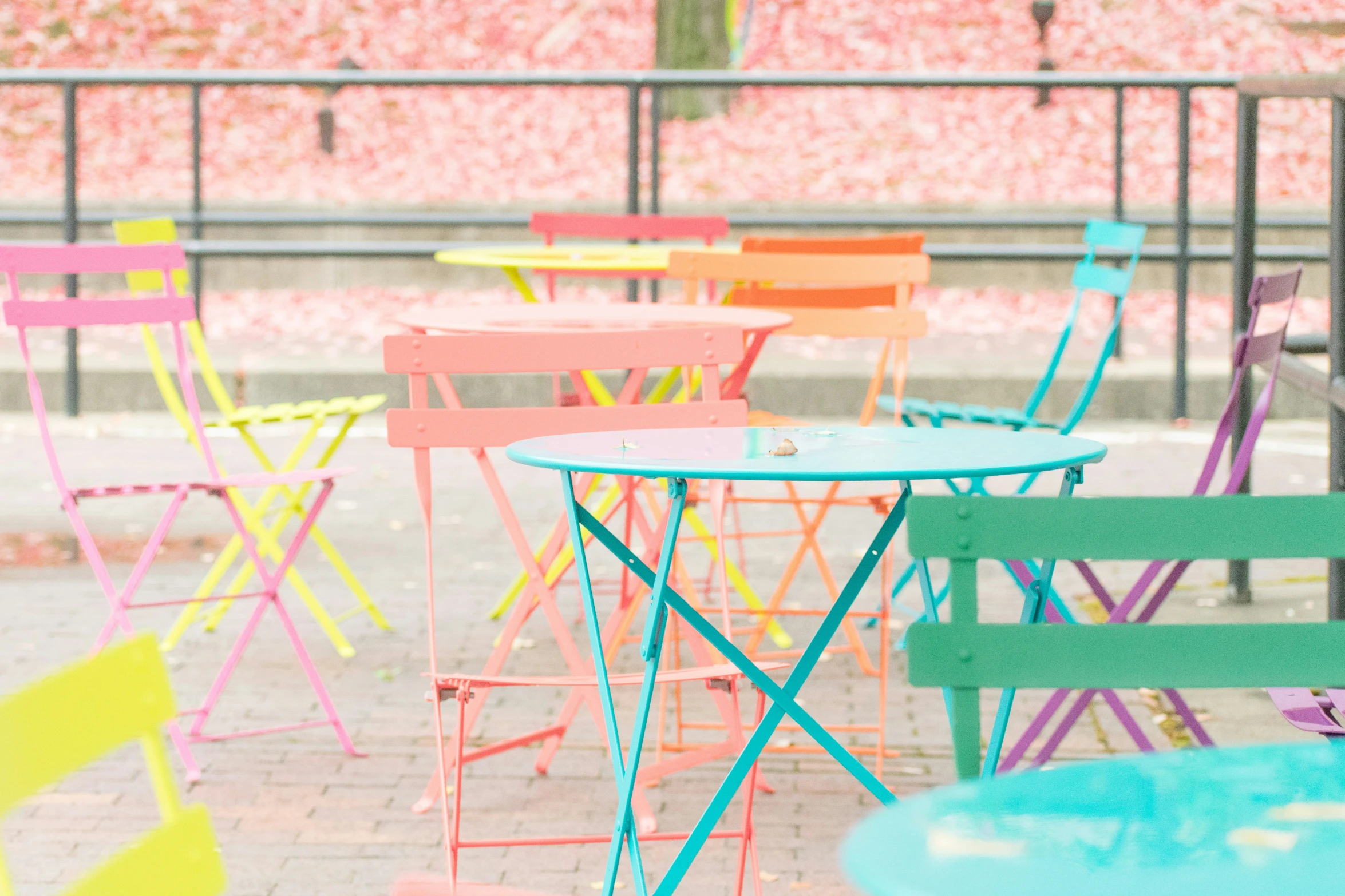 there is a room full of colorful chairs