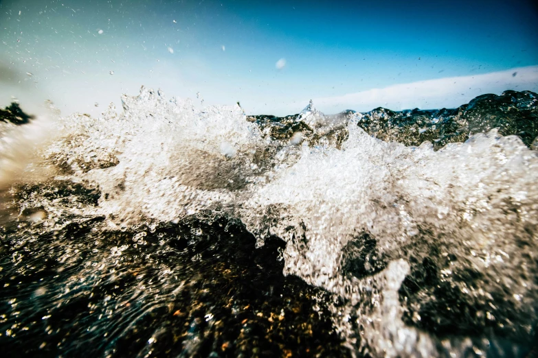 an image of a wave with ocean spray