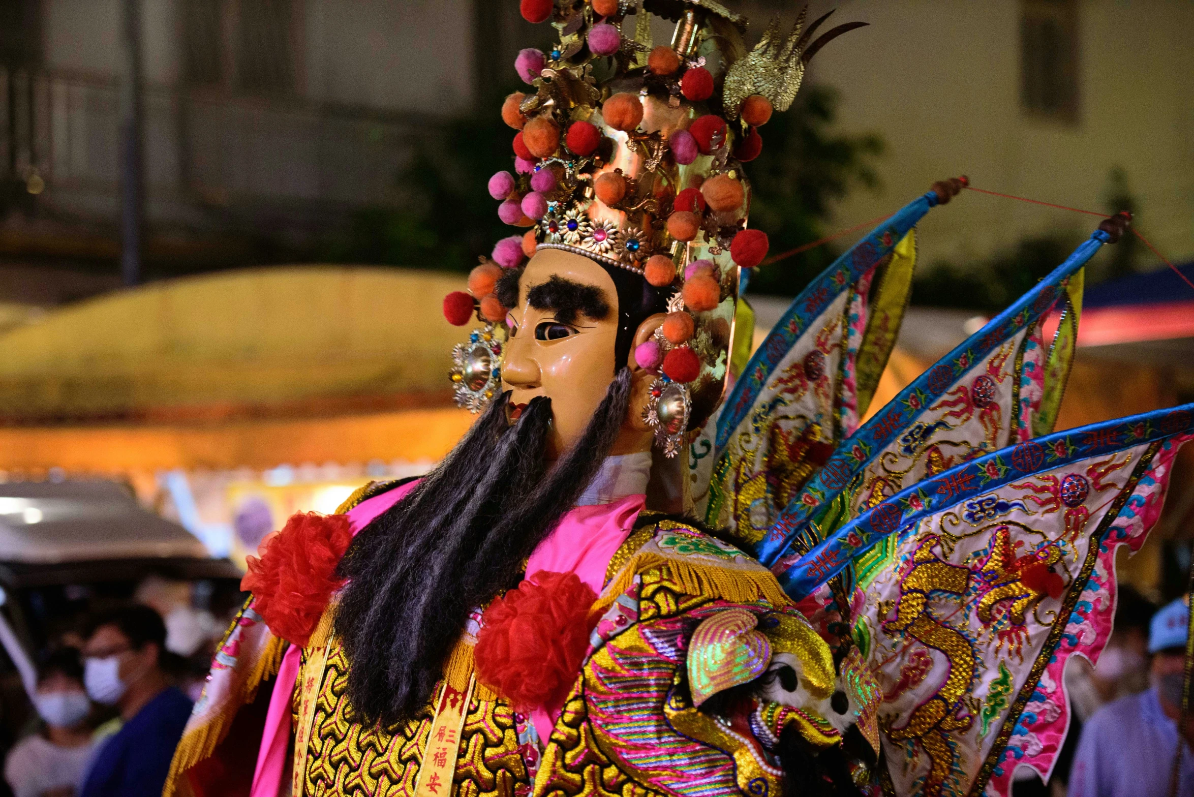 the headdress has lots of feathers in it