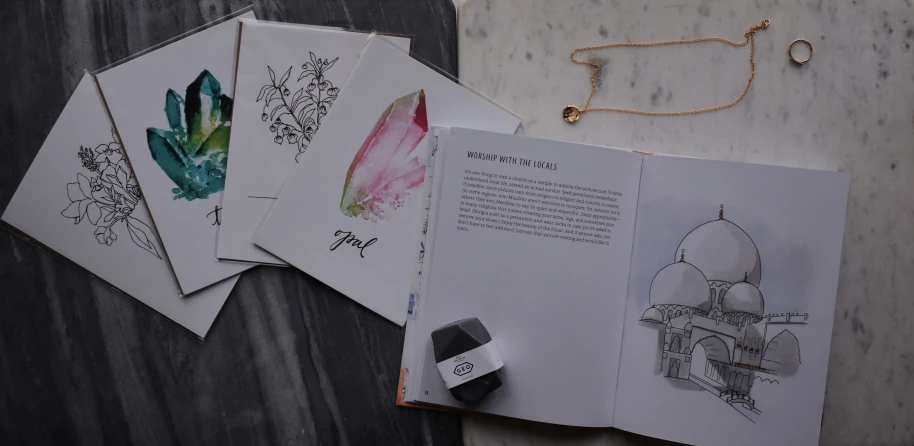 five pages are shown with watercolor drawings and a rubber stamp