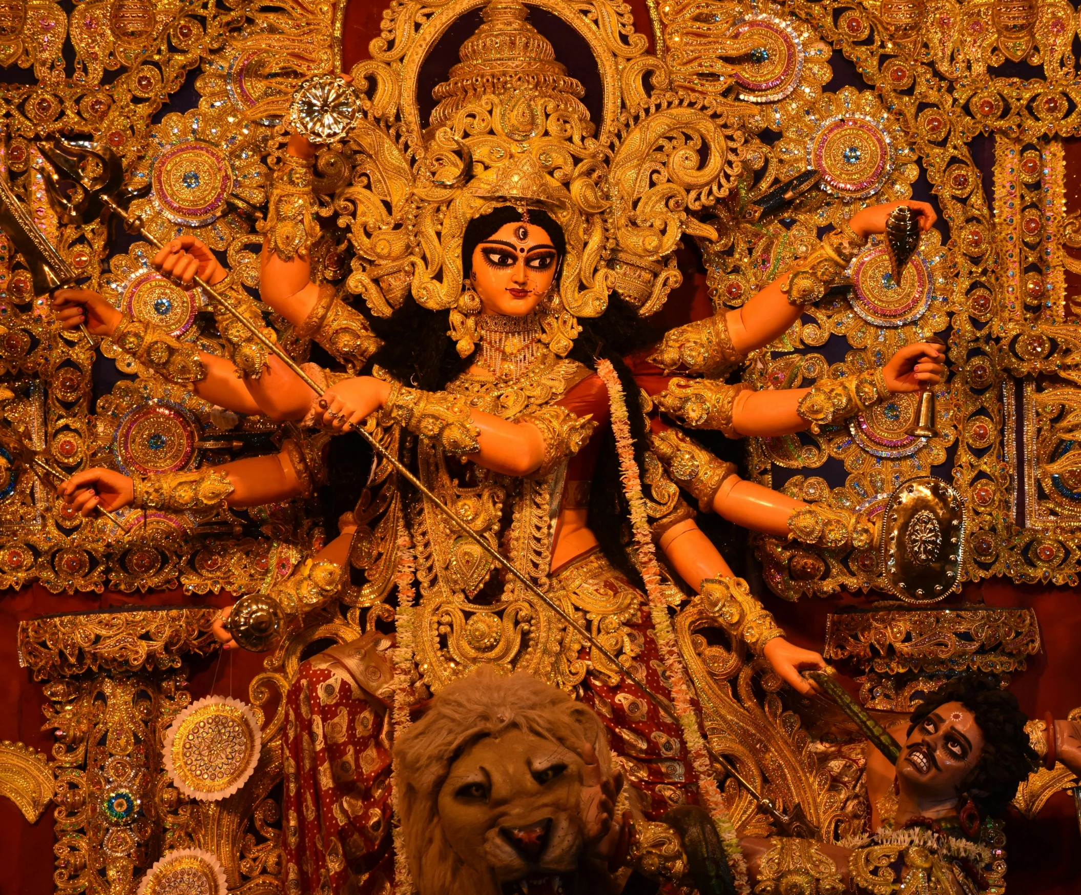 the statue in a temple is adorned with a woman