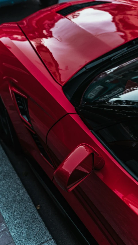 the back window of a red sports car