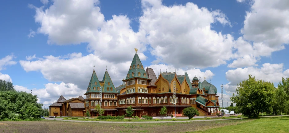 a large castle like house surrounded by trees