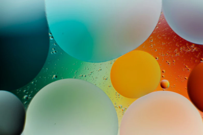 oil bubbles and colored circles are arranged together