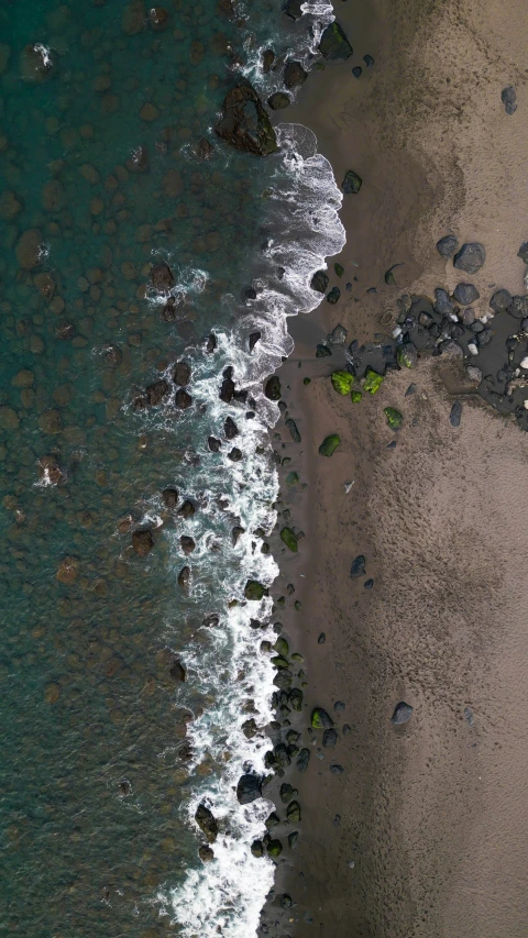 an aerial view of the beach from above