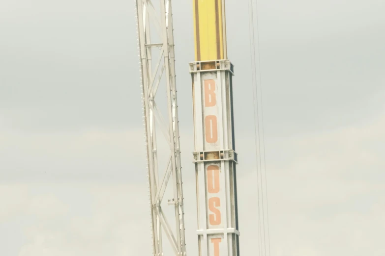 a large white clock tower sitting on the side of a tall building