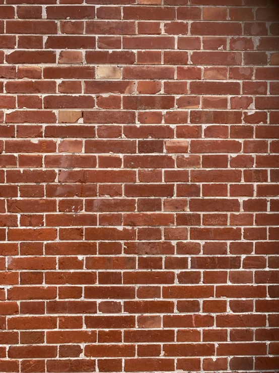 the image of a brown brick wall is displayed