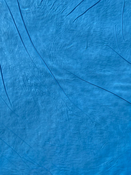 a person laying on top of a swimming board