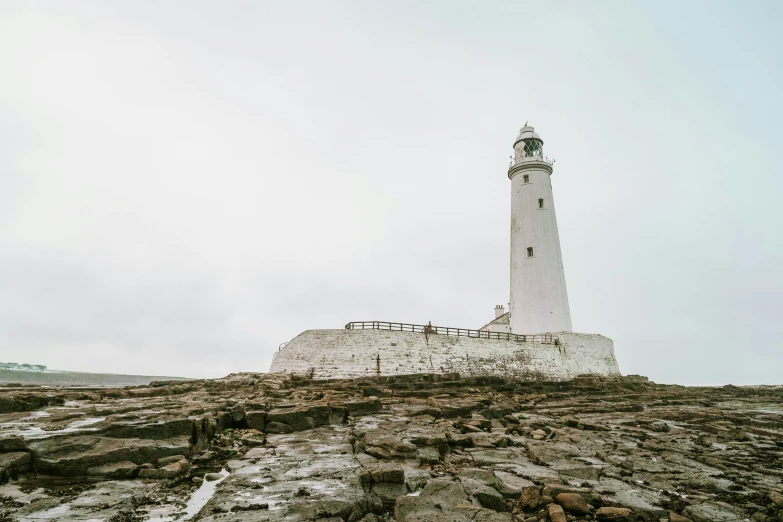 the lighthouse has a light house at the top