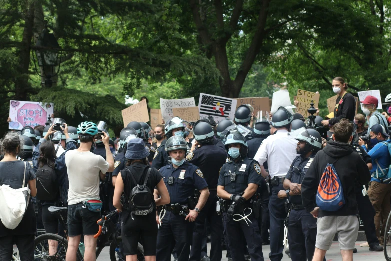 a group of police officers standing near each other