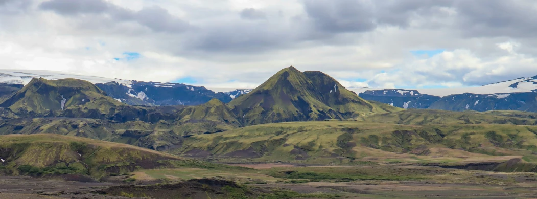 the beautiful mountains that surround the valley are covered in snow