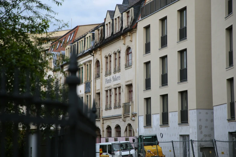 some very tall buildings on a city street