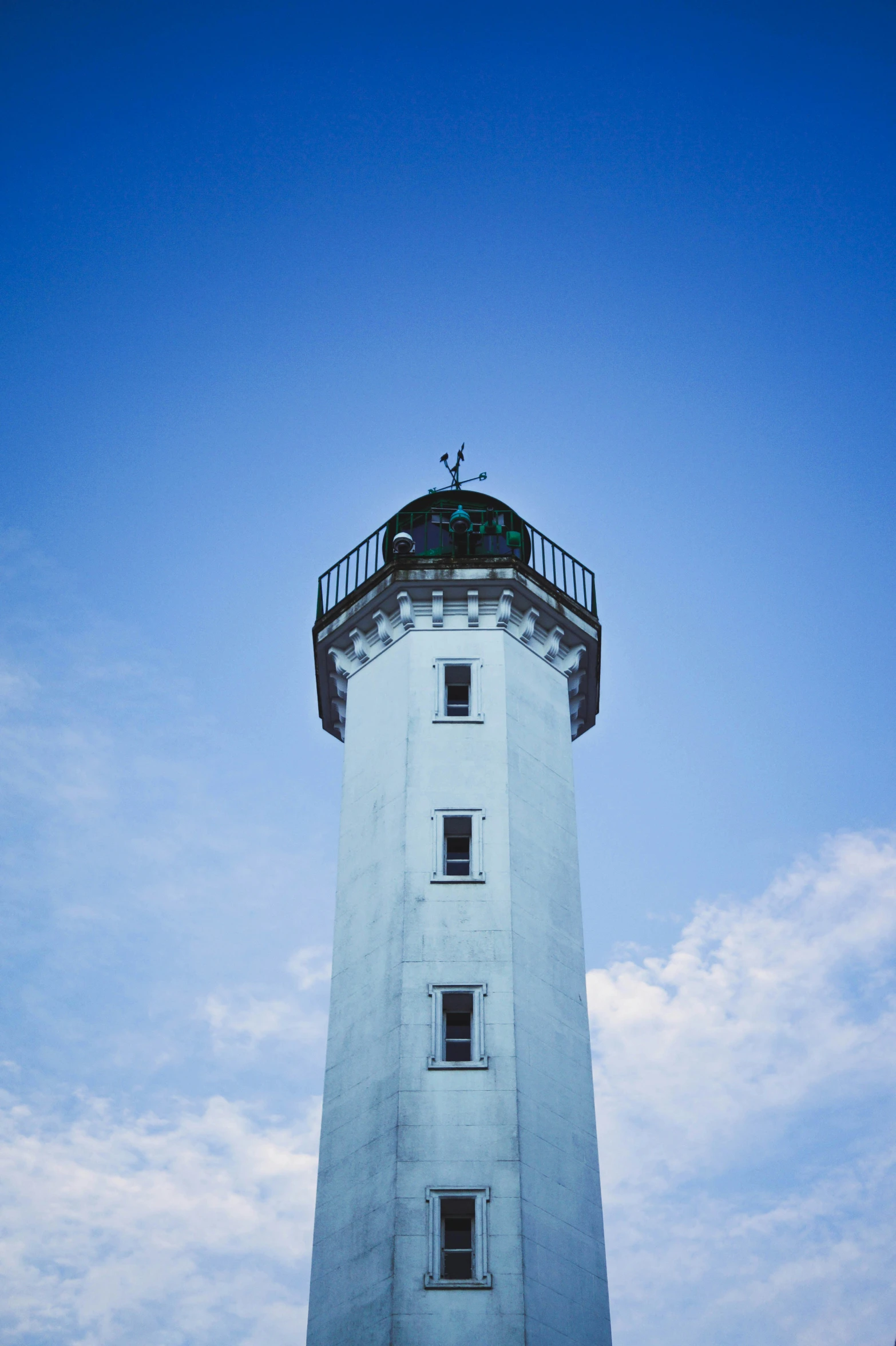 a view of the top of the tower on the lighthouse