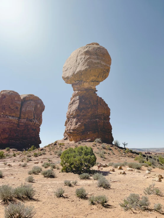 the large rock has several smaller rocks in the middle of it