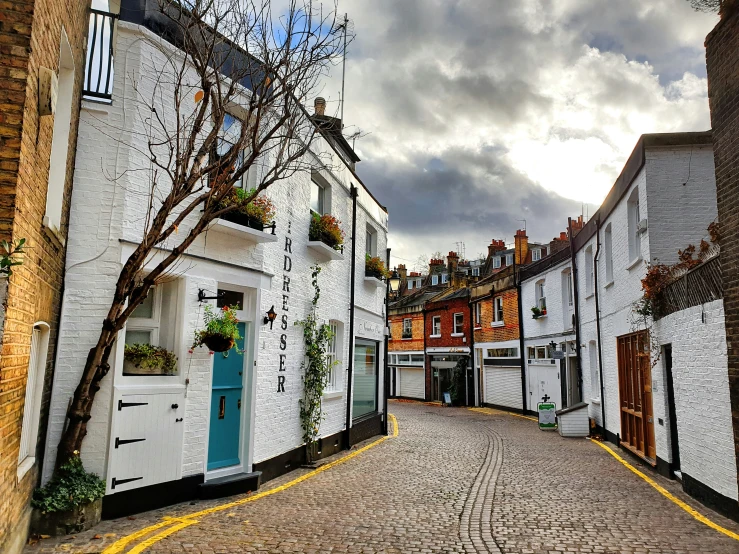 several buildings in the alley that look out over the town