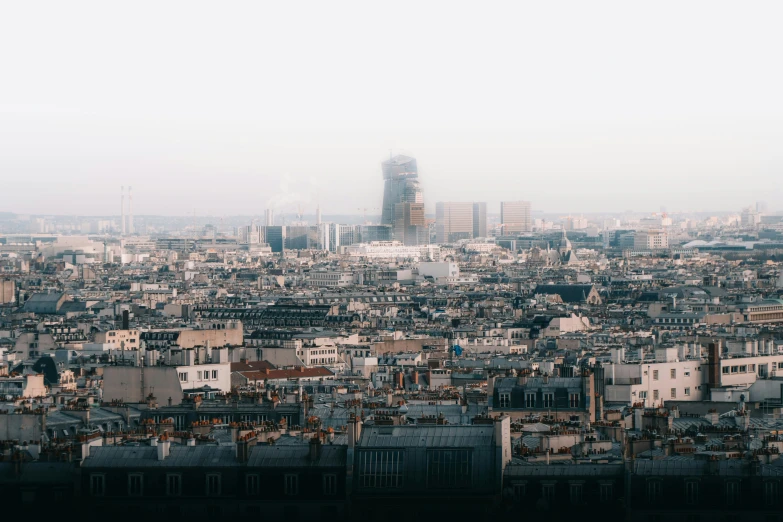 the top of a tall building near a city