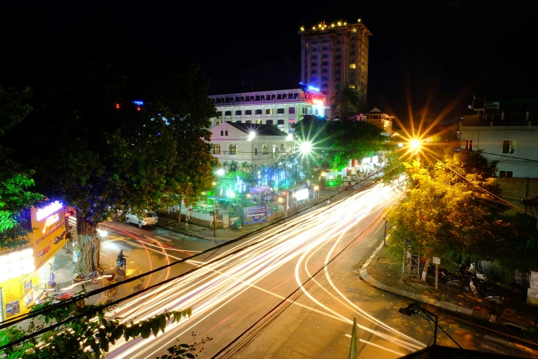 a city road with multiple cars in it