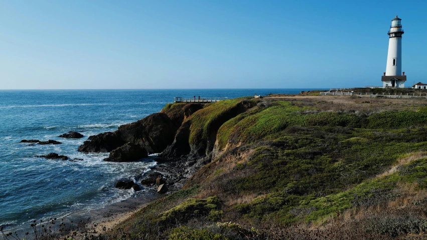 a light house with a view over the ocean