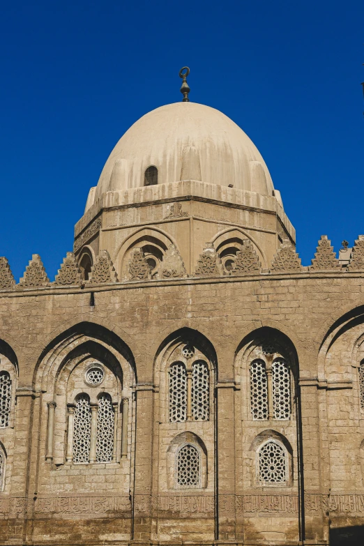 an old building with domes and cross windows