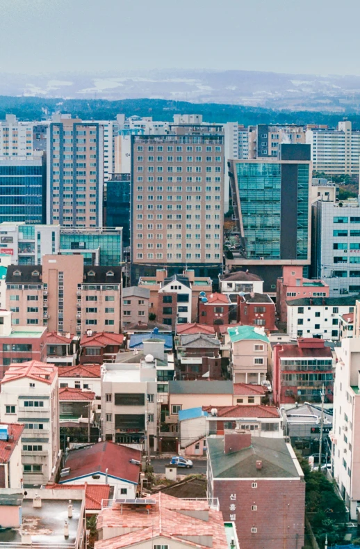 a tall building is next to some buildings