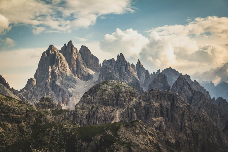 large mountains sit in the distance under blue skies