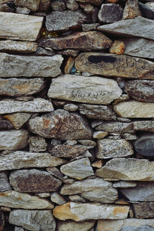 the wall made of rocks is shown as well