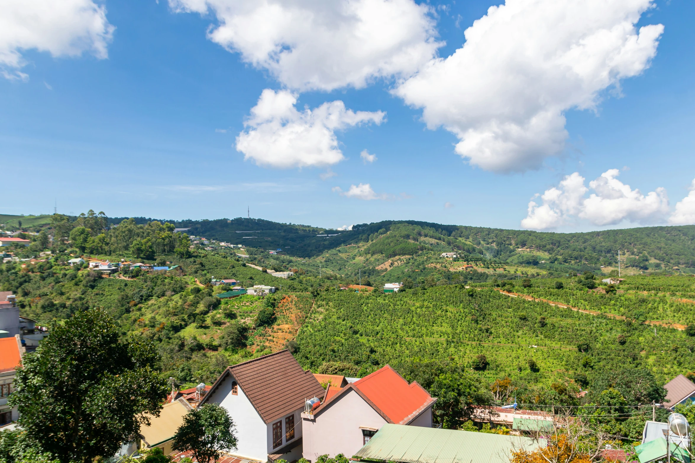 view of small city in mountainous area on nice day