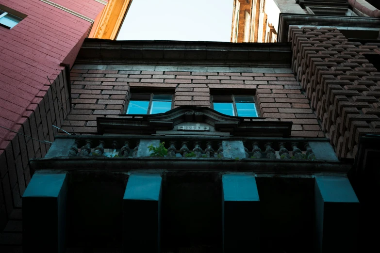 the facade of a building with windows in the middle