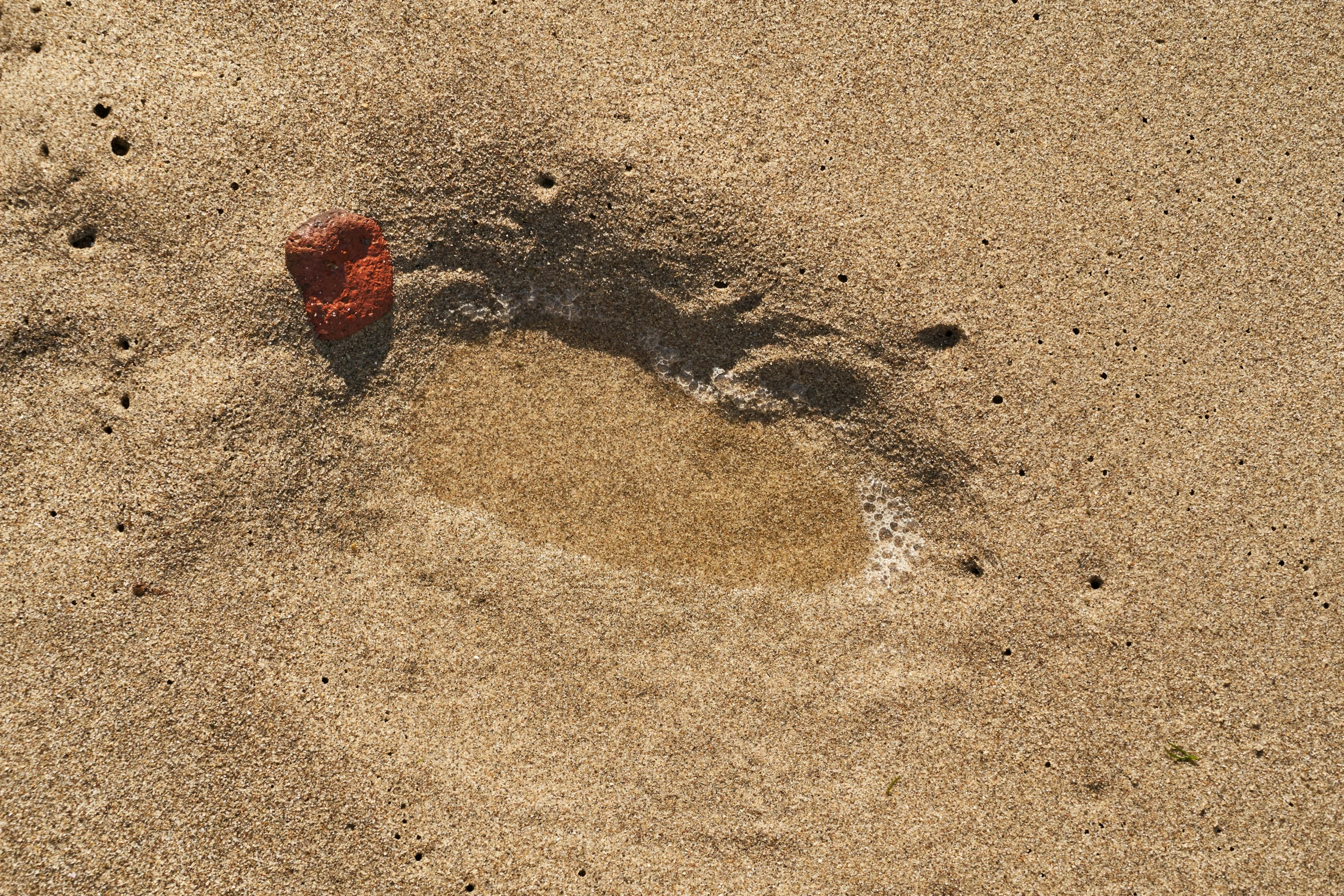 a red piece of material that looks like a fire hydrant