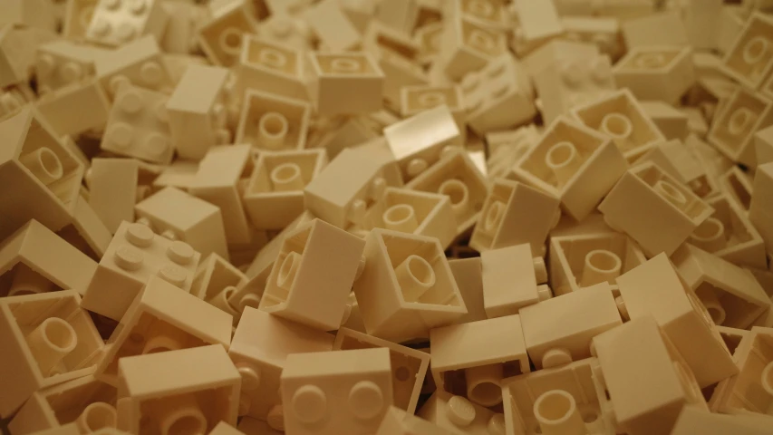 a bunch of brown toys laying on top of a floor