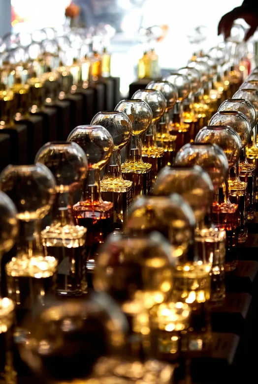 a row of rows of wine glasses in an array