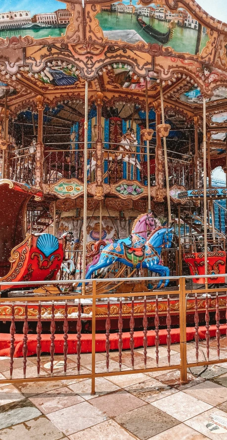 a large merry go round on display in a park