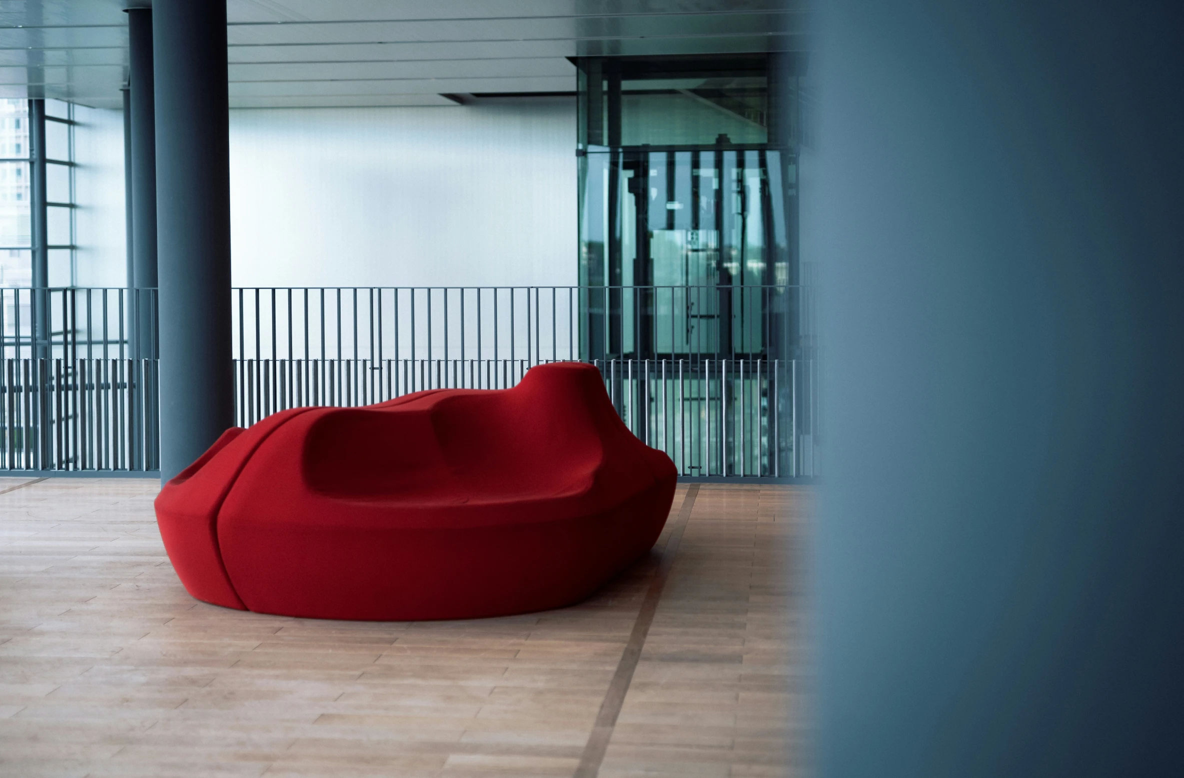 a chair sitting on the floor with a red base