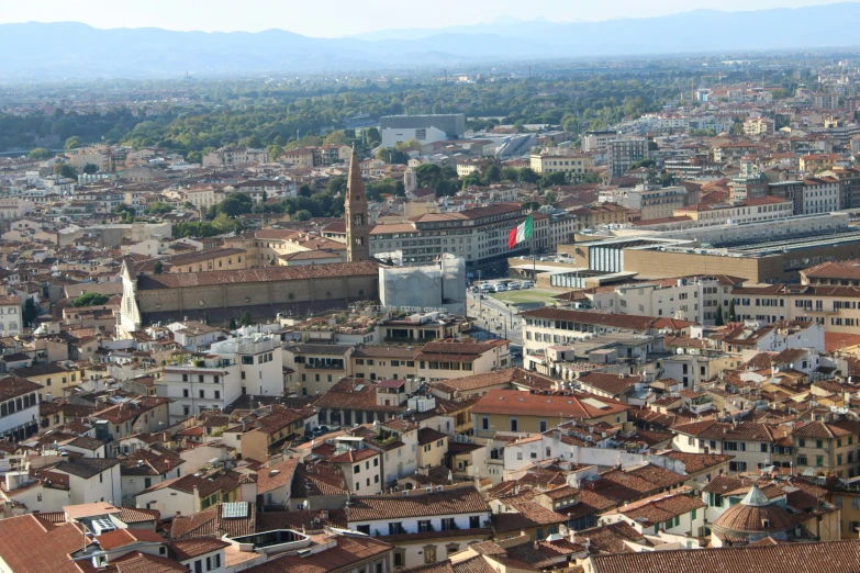 aerial view of city with many brown rooftops