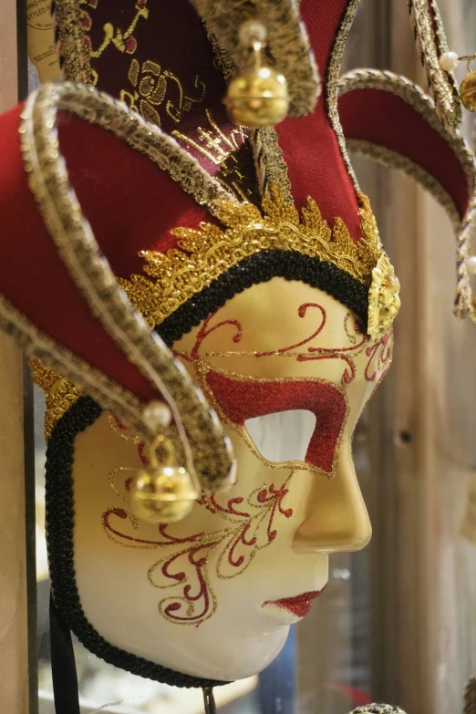 a close up of a fancy mask in a room