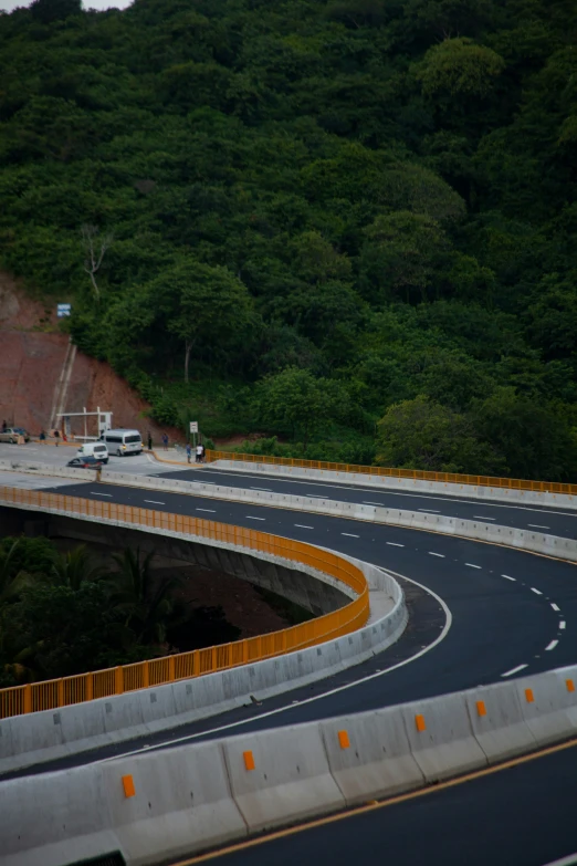 highway intersection on hilly mountain top near mountain