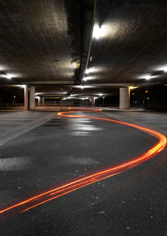 a long exposure po of a traffic light at night