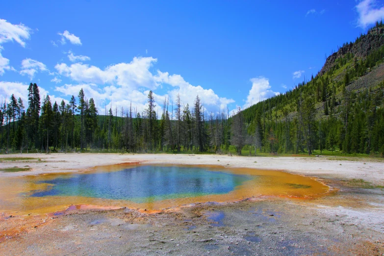 the blue pool in a large geoglyoidal body of water