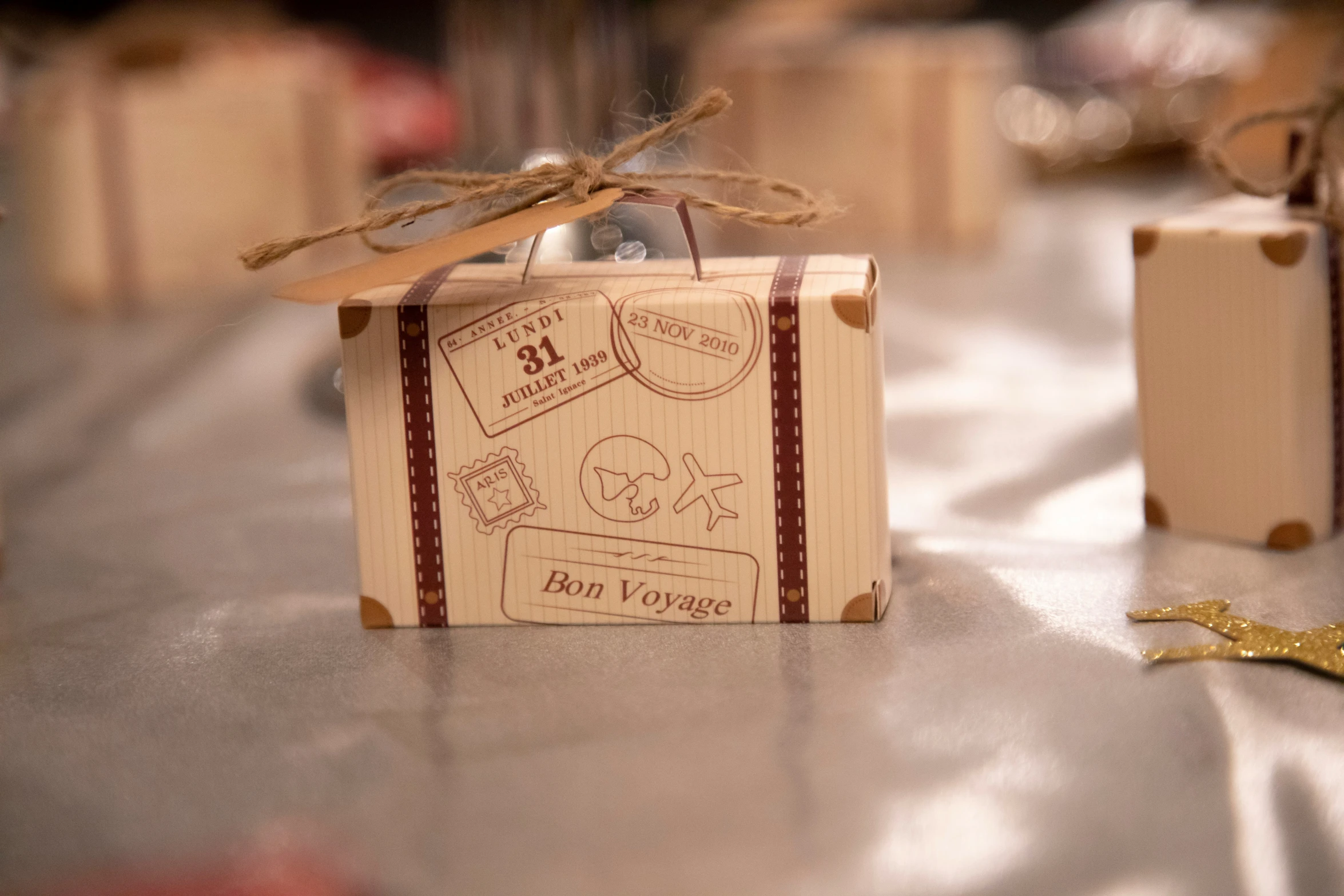 a wooden box sitting on a counter with scissors