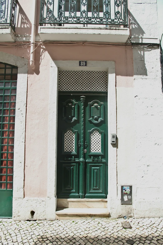 a building with an ornate ironwork on the door