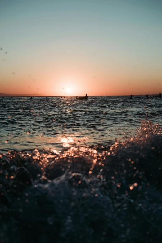 a body of water filled with small waves