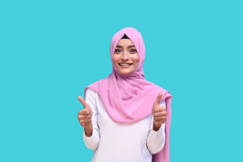 a woman giving the thumbs up sign